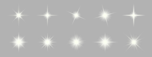 Set of sparkling stars on transparent background. Glow effect. Christmas concept. Festive lights. PNG image