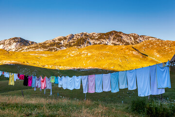 Clean clothes hanging on washing line.