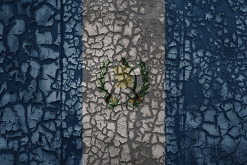 flag of guatemala on a old grunge metal rusty cracked wall background