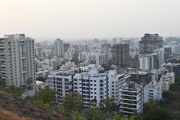 View of Pune in summer, Cityscape Skyline, buildings holdings, Signboards, and banners, Pune,...