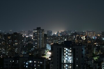 Fototapeta premium View of Pune in summer, Cityscape Skyline, buildings holdings, Signboards, and banners, Pune, Maharashtra, India