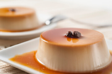 two caramel and egg custard in macro view