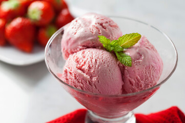 strawberry ice cream in a cup