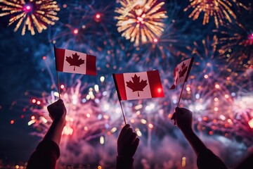 Hands raise Canadian flags against fireworks, celebrating Canada