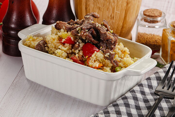 Traditional couscous with beef and vegetables