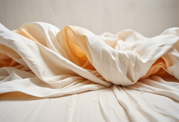 White fabric with soft, flowing folds and creases