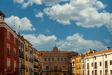 The central square of Cuenca, Spain, with its colorful buildings and medieval style