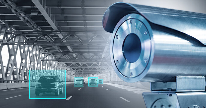 Camera for recording car speeds. CCTV near highway. Camera automatically recording speeds of traffic violations. Highway safety system. Camera for license plate recognition. Videocam near road