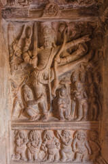 Sculpture or carving of Lord Vishnu. Vamana-Trivikrama Avatar. fifth Avatar of Vishnu at Badami Cave Temple 2, Karnataka, India.
