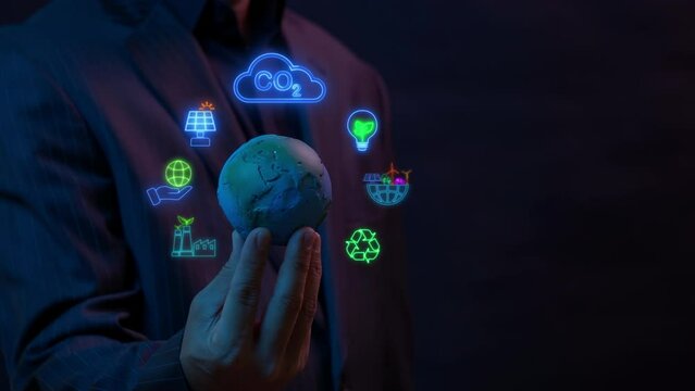 Net zero emissions by 2050 to change climate and net zero greenhouse gas emissions target. Sustainable development and green business concept. Businessman showing animation of net zero icon.
