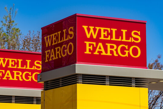 Salt Lake City, US-April 10, 2024: Wells Fargo Bank sig in bright red with bright blue sky in background.