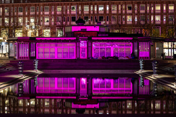 Stockholm, Sweden  The reflection of a landmark building in the  Kungstradgarden park at night...