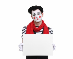Sad mime artist with blank sign on white background