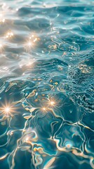 A close up of the surface of water with sun rays.
