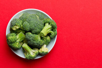 broccoli of fresh green broccoli in bowl over coloredbackground. , close up. Fresh vegetable