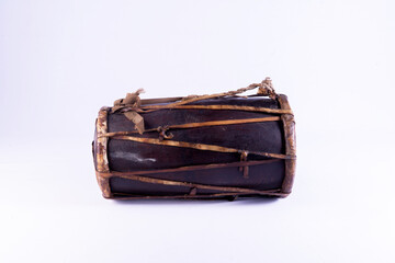 Kendang or gendang is a traditional Indonesian musical instrument made from a tree trunk which has been hollowed out and covered with cow or goat skin