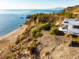 Caravan camping on sea shore, Spain.