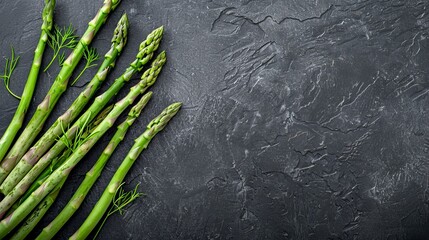 Fresh asparagus bunch on black background