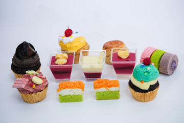 Dessert for afternoon Tea or High Tea , macaron, scone, cake, cup cakes in many color