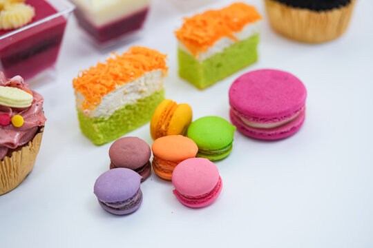 Dessert for afternoon Tea or High Tea , macaron, scone, cake, cup cakes in many color