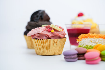 Dessert for afternoon Tea or High Tea , macaron, scone, cake, cup cakes in many color