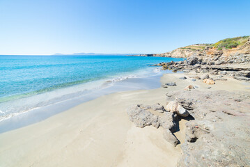 Beautiful beach and water bay in the greek spectacular coast of Peloponnese. Turquoise blue...