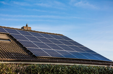 Photovoltaic panels on a roof  of family house, solar system