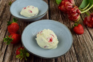 Scoop of vanilla strawberry ice cream