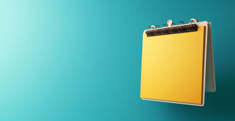 Yellow notepad on the wall with clipping. Suitable for office, organization, education, reminders, planning, notes, goals, and to-do lists.