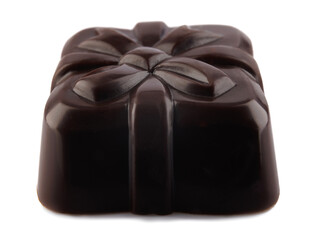 Beautiful candy made from elite dark chocolate isolated on a white background.