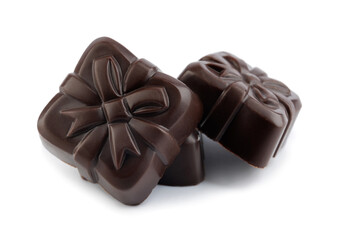  Beautiful candies made from elite dark chocolate isolated on a white background. Art chocolate.