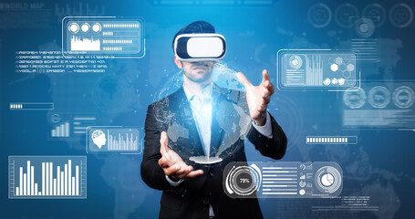 Skilled business man looking data analysis while planning strategy by using visual reality glasses. Professional smart investor checking financial graph holographic while wearing VR goggle. Deviation.