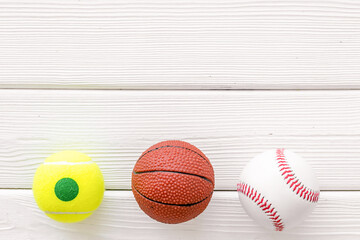 Fototapeta premium Team sport balls, top view. Sport games background