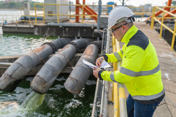Environmental engineers work at wastewater treatment plants,Water supply engineering working at...
