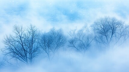   A cluster of leafless trees in a misty, foggy scene, backed by a blue sky dotted with clouds