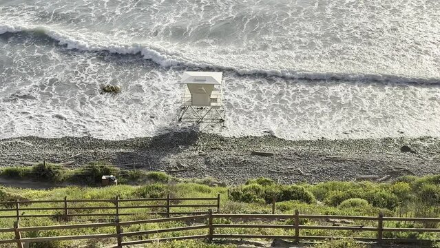 lifeguard tower in Encinitas , California , at High tide
