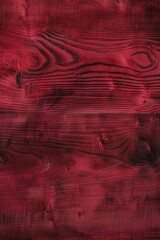 Red wooden texture with grain patterns. Rustic stained wood background. Design for poster, banner, wallpaper, print