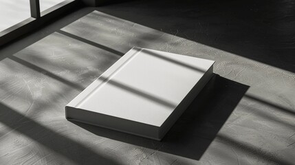 book cover on table with shadows not write anying on it,copyspace
