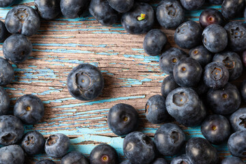 blueberries on wooden background
