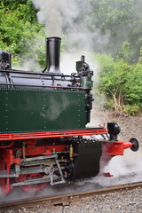 old steam train engine while running