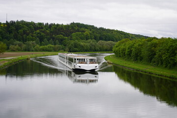 Excursion boat on the Danube river near Bad Abbach, Bavaria, Germany.