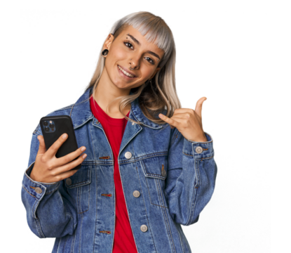 Caucasian young woman with a smartphone showing a mobile phone call gesture with fingers.
