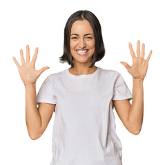 Young Caucasian woman with short hair showing number ten with hands.