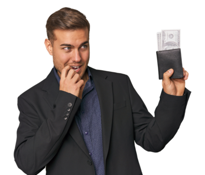 business caucasian man holding tickets relaxed thinking about something looking at a copy space.