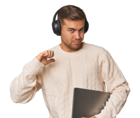 Young student man with a laptop feels proud and self confident, example to follow.