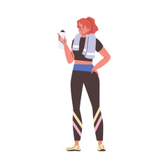 Young woman in sports clothes and with a towel on her shoulders