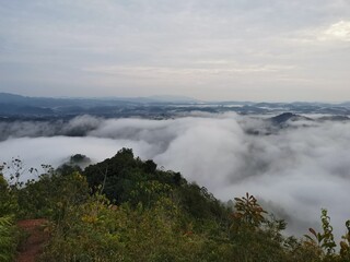 Mountains beneath fog