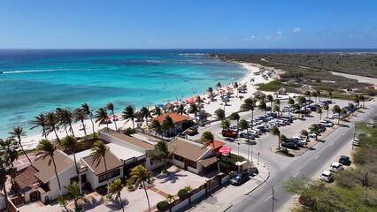 Naklejka premium Arashi Beach At Oranjestad In Caribbean Netherlands Aruba. Beach Landscape. Caribbean Paradise. Oranjestad At Caribbean Netherlands Aruba. Seascape Outdoor. Nature Tourism.