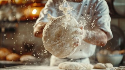 Close-up of a chef tossing pizza dough in the air, skillfully preparing the base for a delicious handmade pizza masterpiece.