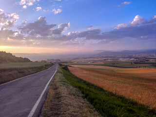 sunset over the road